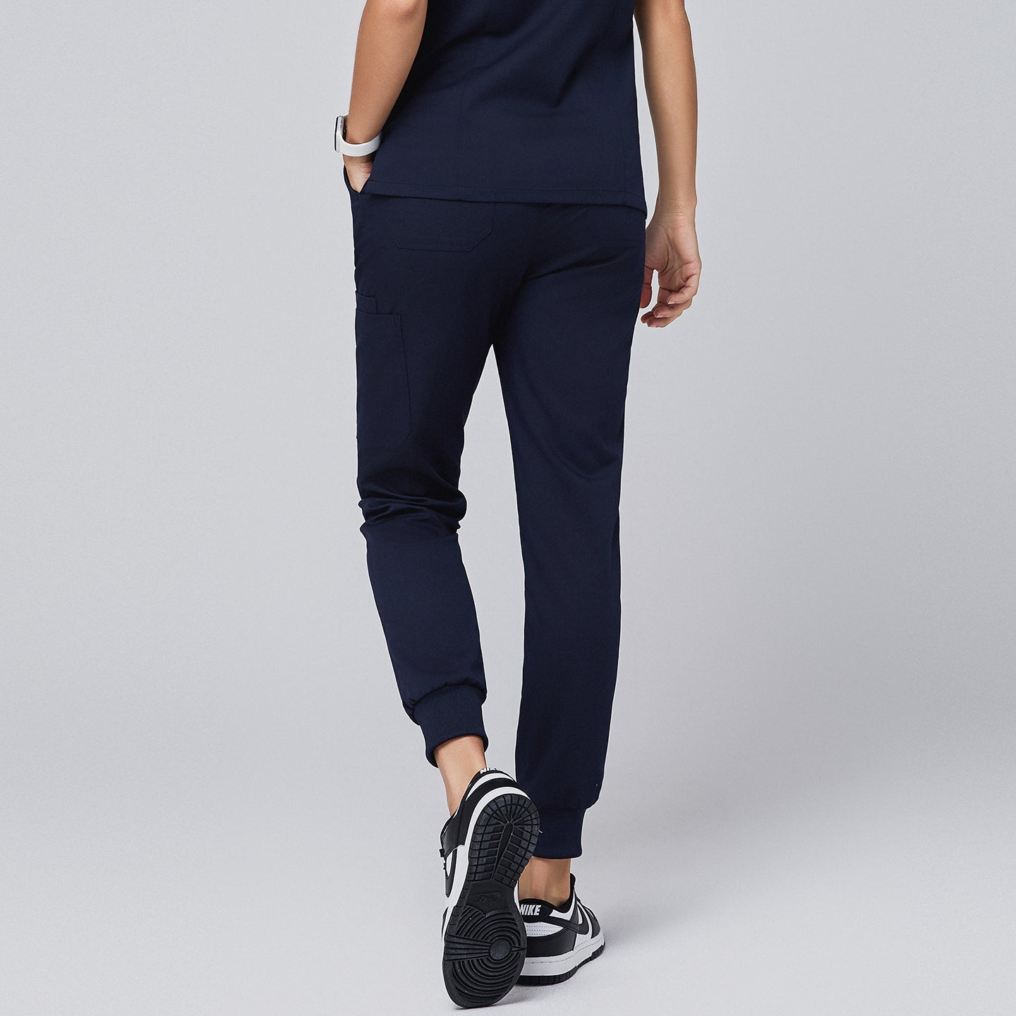 Image of Stylish navy jogger scrub pants showcasing a sleek back design with practical pockets, perfect for modern healthcare professionals,Navy